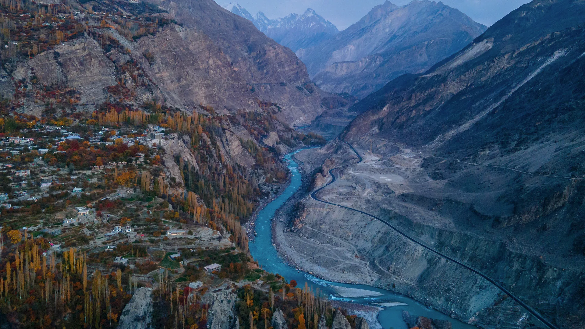 Road, river, and mountains in Hunza Valley, Pakistan